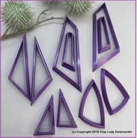 Set of 10 asymmetrical clay cutter shapes.