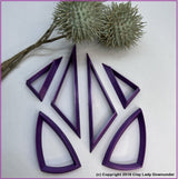Set of 10 asymmetrical clay cutter shapes.